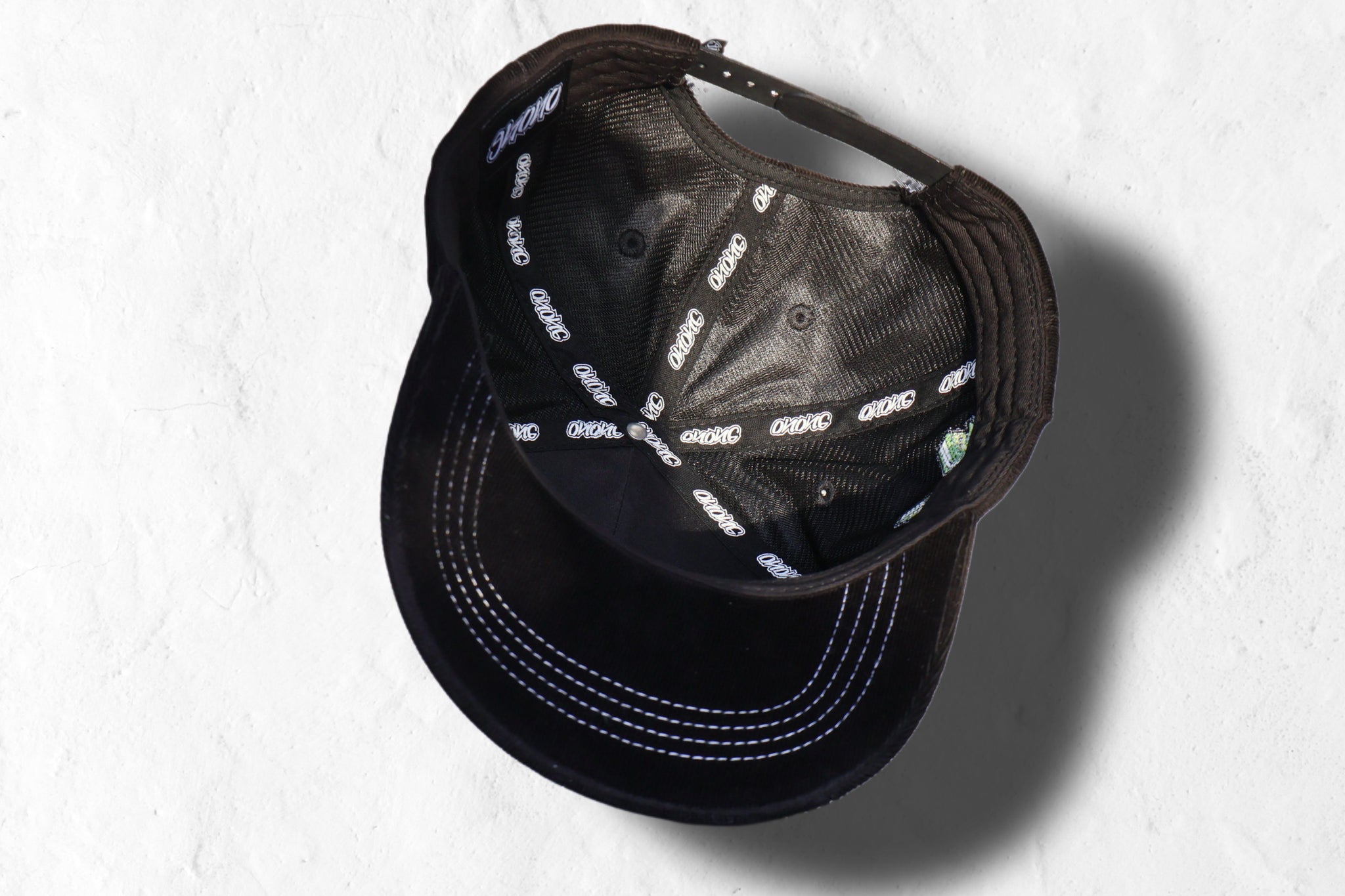 Black corduroy snapback hat