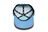 Blue suede snapback hat.